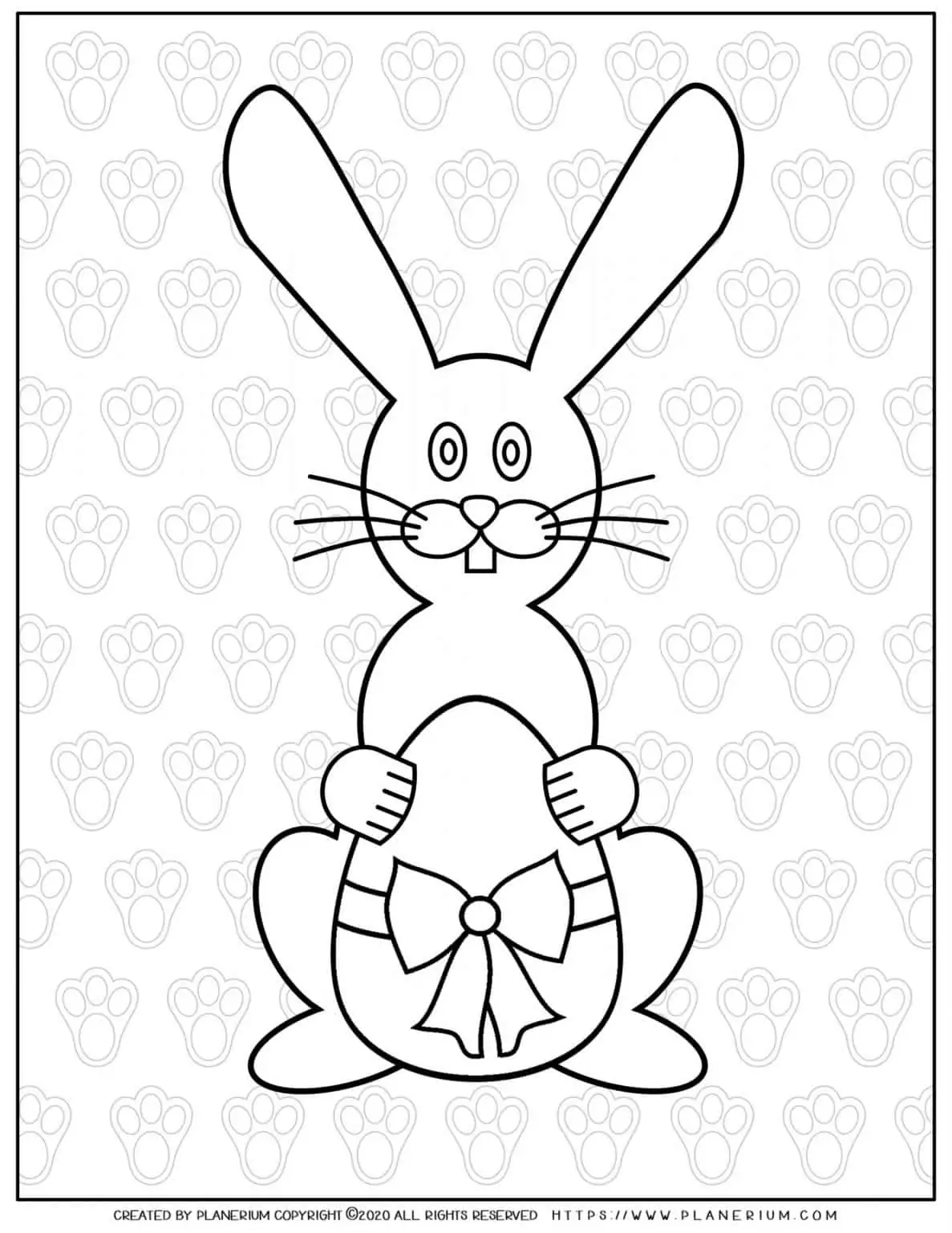 Easter bunny holds an egg