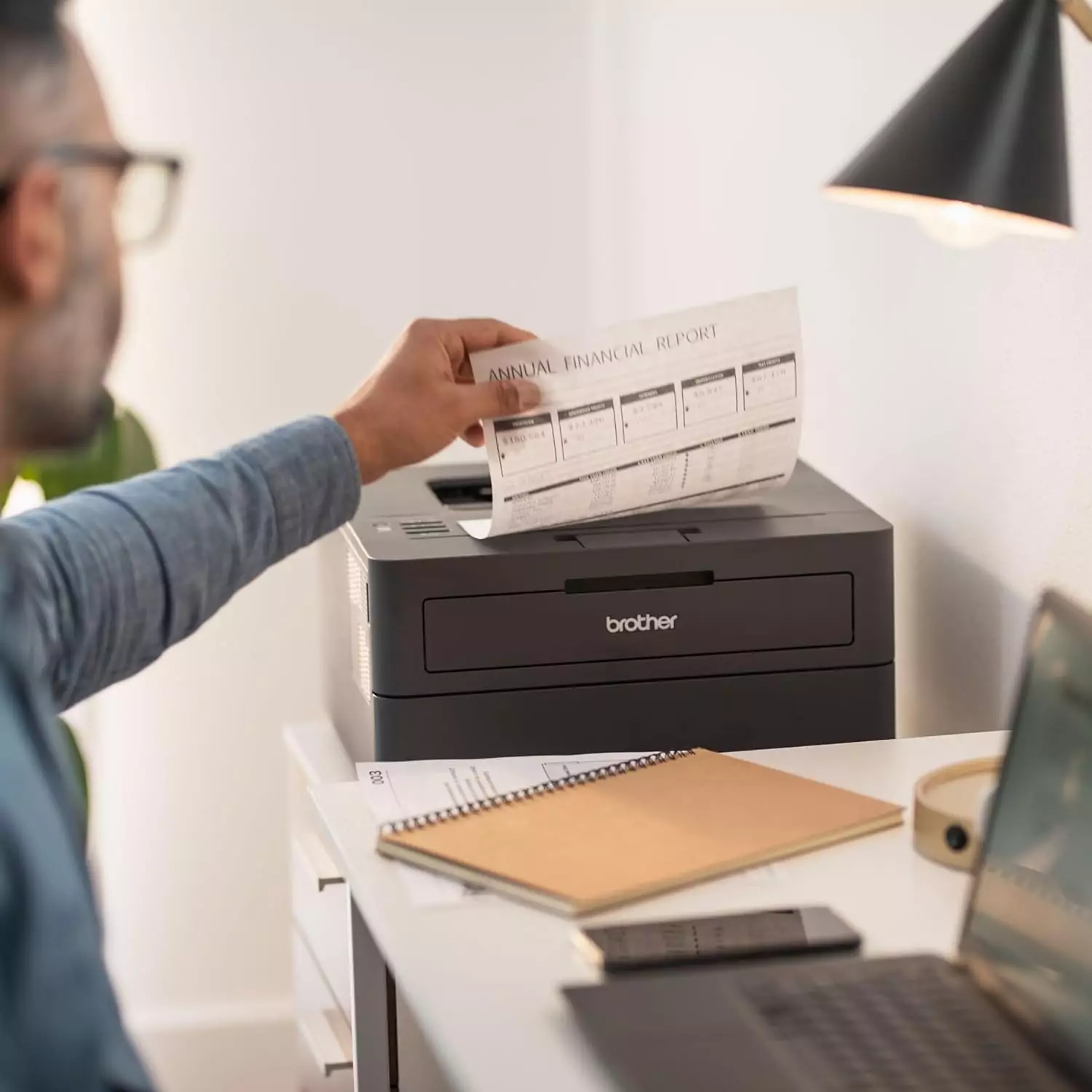 Brother HL-L2405W Wireless Monochrome Laser Printer in a classroom setting, perfect for educators seeking efficient mobile printing solutions.