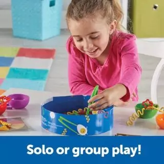 Enhance fine motor skills with the 67-piece Noodle Knockout game. Designed for ages 4 and up, this engaging activity set boosts child development.