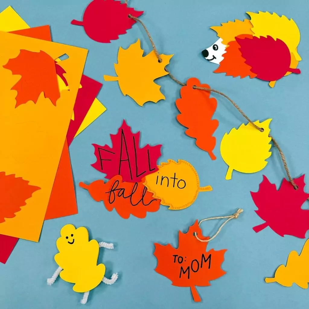Fall Leaf Cutouts: Enhance classroom decor with double-sided cardstock featuring maple and oak designs, perfect for seasonal decoration.