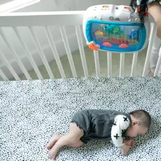 Baby Einstein Sea Dreams Soother: Ocean-themed crib toy and sound machine for newborns, featuring musical sounds to comfort and soothe baby sleep.