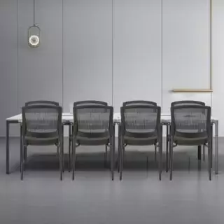 Ergonomic Clatina classroom guest chair featuring a breathable mesh back, stackable design, and lumbar support, ideal for educators seeking comfort.