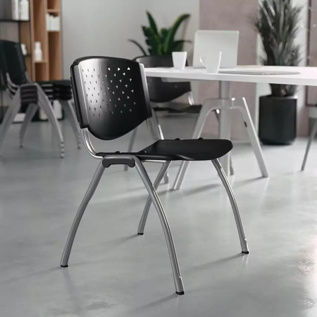 Ergonomic classroom chairs feature contoured seats and perforated backs, enhancing comfort and support for an ideal educational environment.