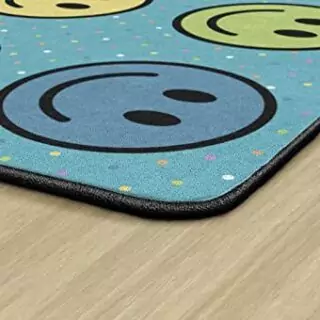 Colorful and educational Smiley Seating Area Rug by Flagship Carpets, perfect for enhancing playful learning spaces in kids' classrooms.