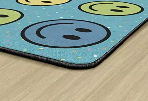 Colorful and educational Smiley Seating Area Rug by Flagship Carpets, perfect for enhancing playful learning spaces in kids' classrooms.