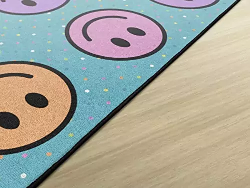 Vibrant educational seating rug designed for kids' classrooms, featuring colorful smiley faces to enhance learning and create an inviting play area.