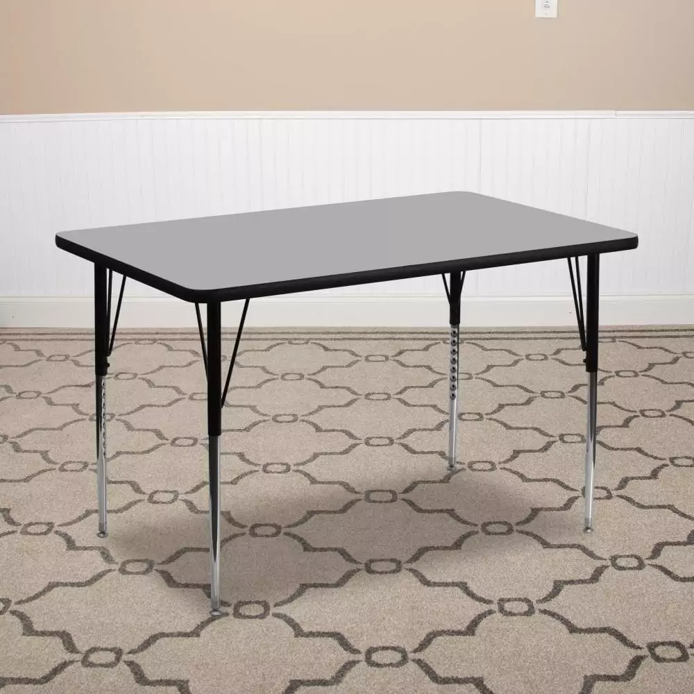 Rectangular grey activity table, 24x48, designed for classroom learning centers, enhances educational setups with ample workspace and functionality.