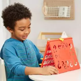 Enhance learning with the Guess Who board game, a double-sided educational activity from Hasbro Gaming, perfect for 2 player kid's game nights.