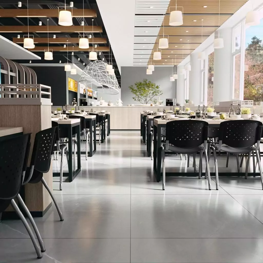 Ergonomic Hercules classroom chairs feature contoured seats and perforated backs, enhancing comfort and style in a modern educational setting.