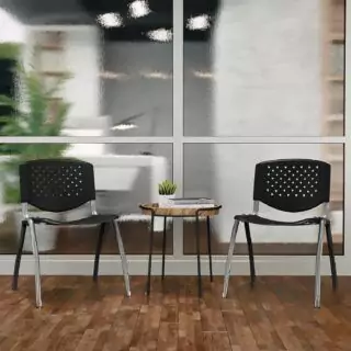 Ergonomic classroom chairs featuring contoured seats and perforated backs, ideal for enhancing comfort and style in modern learning environments.