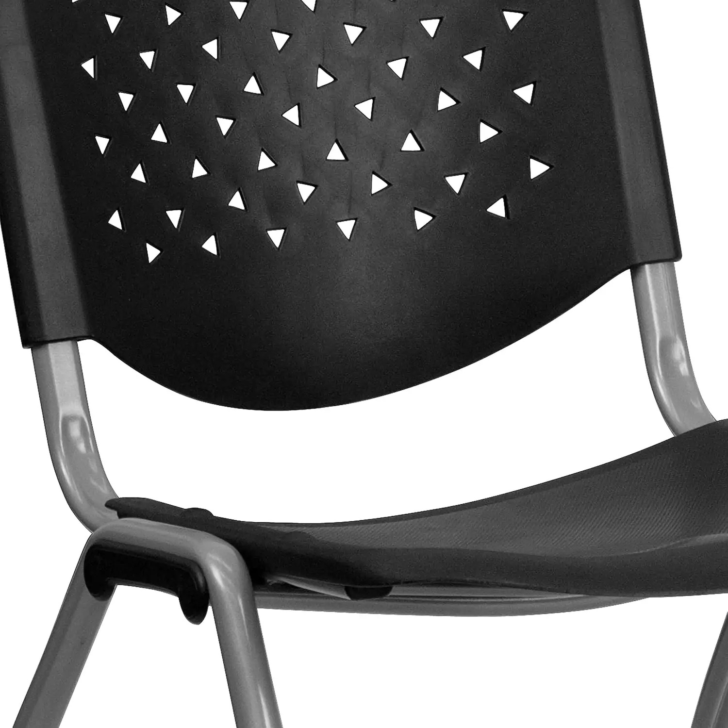 Ergonomic classroom chairs featuring contoured seats and perforated backs in a contemporary educational environment for improved comfort.