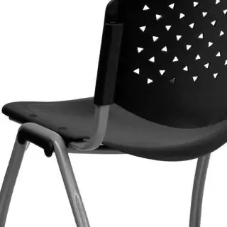 Ergonomic classroom chairs featuring contoured seats and perforated backs enhance comfort and promote better posture for students.