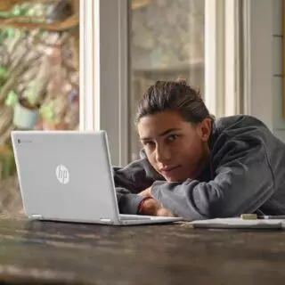 Explore the HP Chromebook 14-inch FHD, optimized for educators with an Intel N100 processor, 4GB RAM, and 64GB eMMC storage for efficient learning.