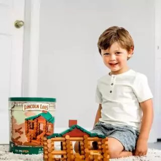 Lincoln Logs 100th Anniversary Tin: Celebrate a century of creativity with 111 real wood pieces, perfect for preschool building fun for ages 3 and up. Vintage collection.