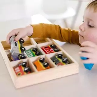 Melissa & Doug Wooden Magnetic Train Set: Engage kids with this interactive educational toy, perfect for developing essential skills through play.