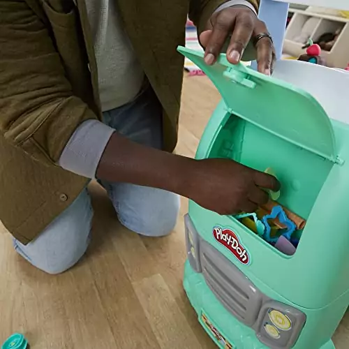 Engage kids in creative play with the Play-Doh Food Truck Playset, featuring 12 vibrant cans for hands-on fun and learning in outdoor activities.