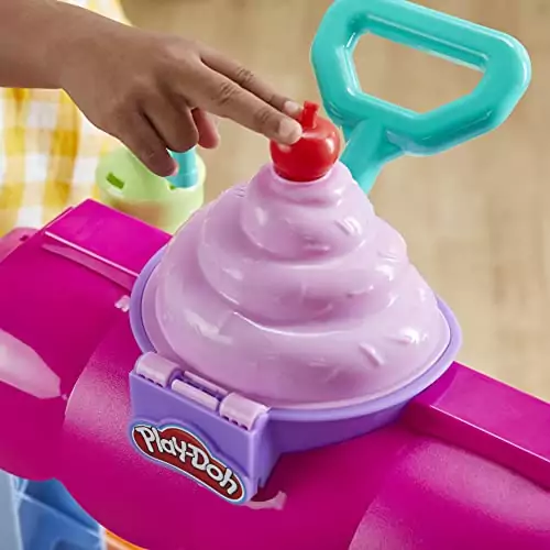 Vibrant Play-Doh Sweet Snacks Truck Playset encourages kids' creativity and imaginative play with delightful pretend food-making tools and accessories.