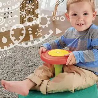 Playskool Sit 'n Spin: Enhance toddler motor skills through interactive spinning play, offering joyful and engaging playtime for young children.