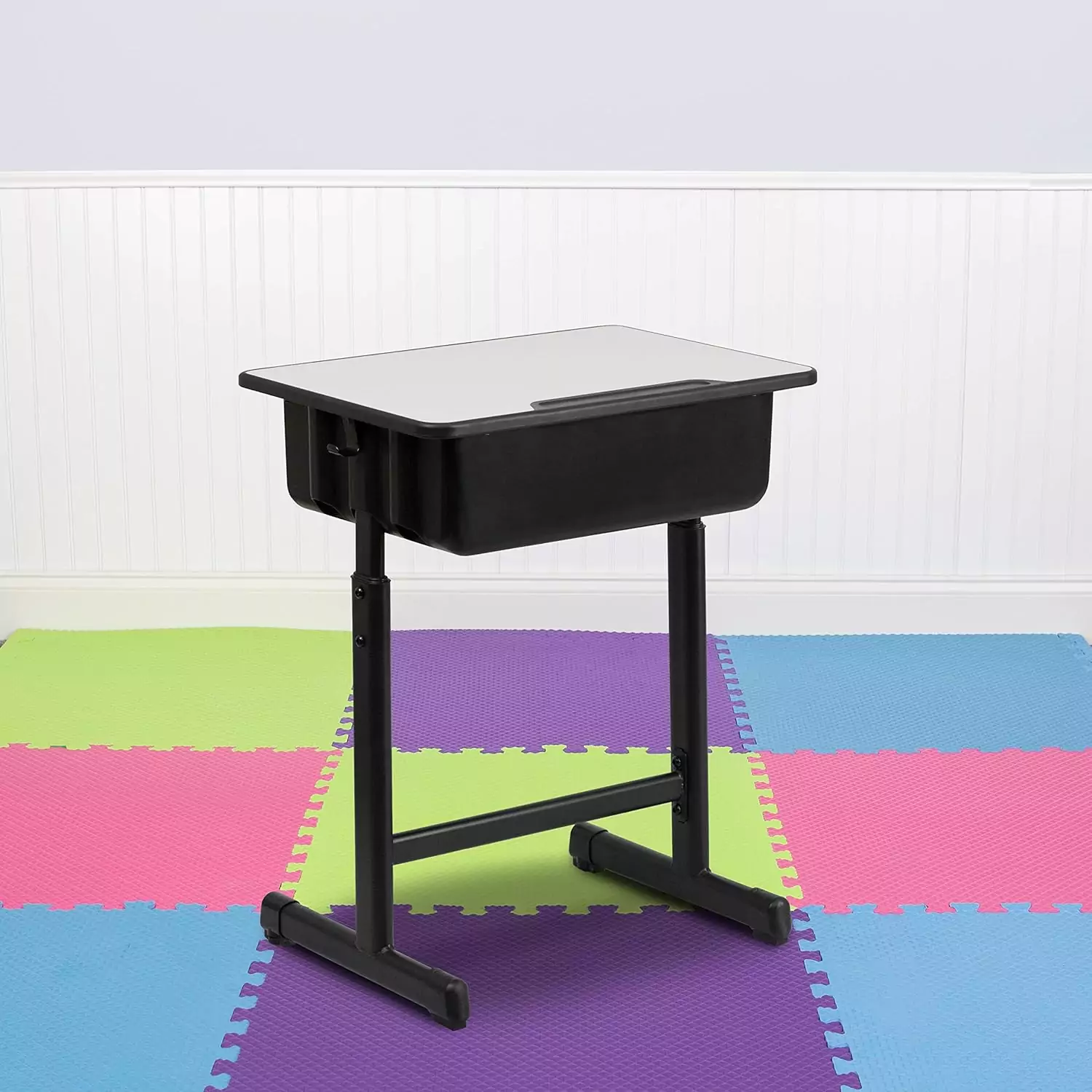 Height-adjustable student desk designed for both classroom and remote learning, promoting ergonomic posture and adaptability in study environments.