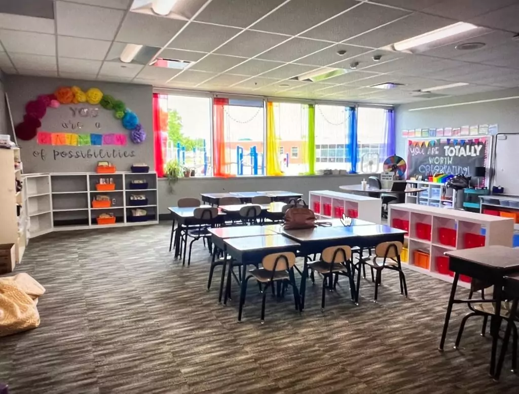 Colorful sheer rainbow curtains ideal for enhancing classroom and nursery backdrops, offering a lively and inviting atmosphere for young learners.