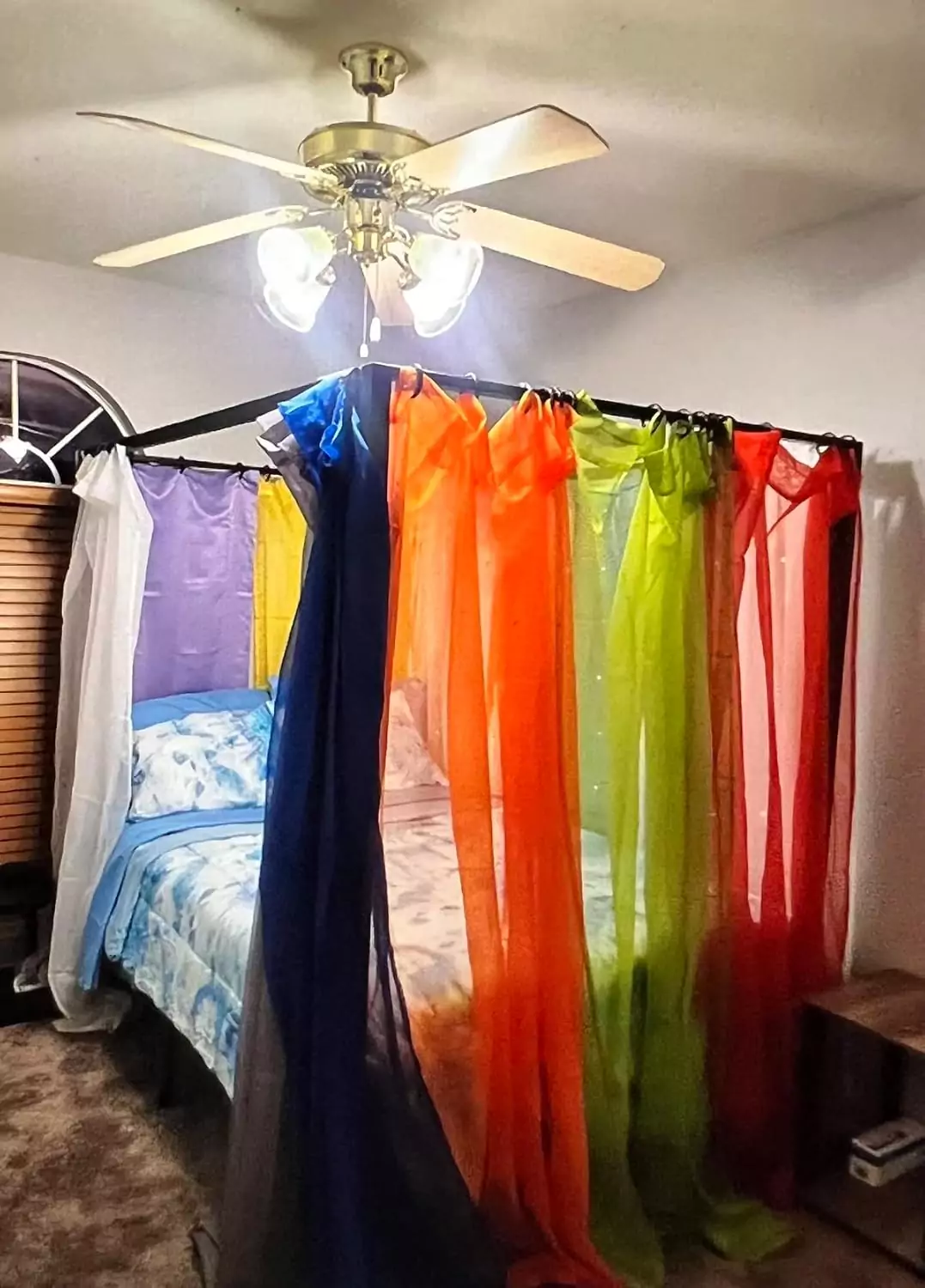 Colorful transparent rainbow curtains perfect for enhancing playroom or nursery decor, providing a bright, playful backdrop for children's spaces.