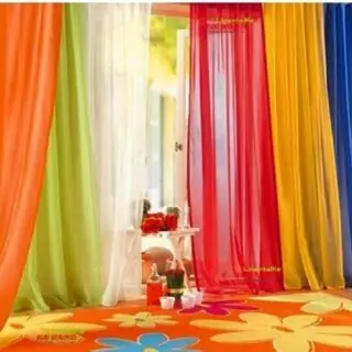 Colorful sheer rainbow curtains ideal for playrooms, nurseries, and classrooms, creating a vibrant atmosphere and playful backdrop.