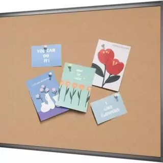 Cork notice board featuring a sleek black aluminum frame, perfect for educators seeking effective classroom displays and organization solutions.