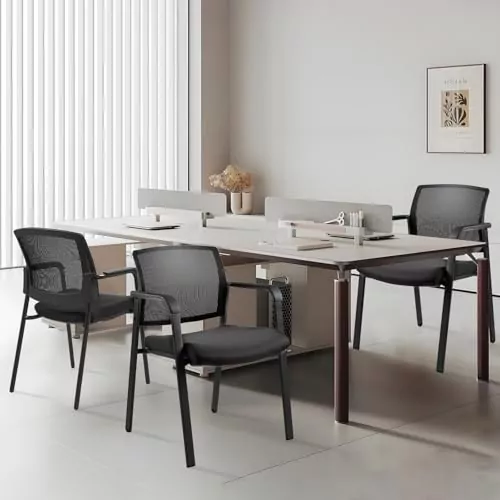 Ergonomic Clatina stacking chairs with mesh backs and upholstered seats provide durable design and lumbar support, perfect for classrooms.