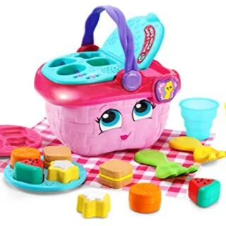Leapfrog Pink Picnic Basket: Engaging Educational Toy for Kids with Shape Sorting Feature, Encouraging Interactive Play and Learning.