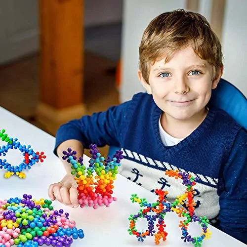 Colorful interlocking building blocks set with 100 pieces, each 1.5 inches in diameter, perfect for enhancing early STEM learning and creativity.