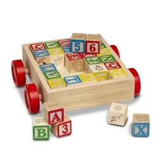 Melissa & Doug ABC Block Cart Toy features 30 solid wood blocks, ideal for early learning and development. Perfect for interactive and educational play.
