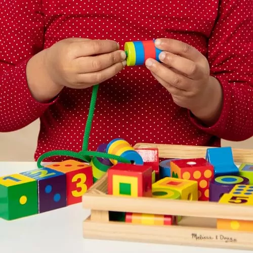 Engage in creative, educational play with the Melissa & Doug Wooden Lacing Beads Set, promoting fine motor skills and color recognition.