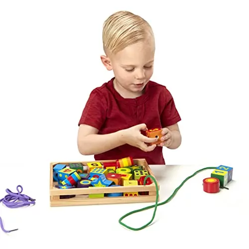 Enhance creativity with a Wooden Lacing Beads Set for kids, featuring 27 vibrant beads and 2 laces, ideal for educational and fine motor skills development.