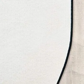 Enhance early learning with the 6ft x 9ft oval blue Kid Value Plus classroom rug, designed for educational activities and classroom engagement.