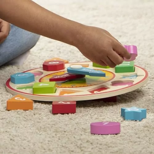 Wooden Shape Sorting Clock by Melissa & Doug: Educational Toy for Kids - Enhances Early Learning, Develops Time Telling Skills, and Encourages Shape Recognition.