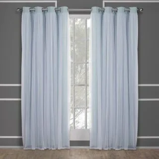 Luxe Talia sheer blackout curtains feature a grommet style, perfect for classrooms, providing excellent ambient light control and enhancing decor.