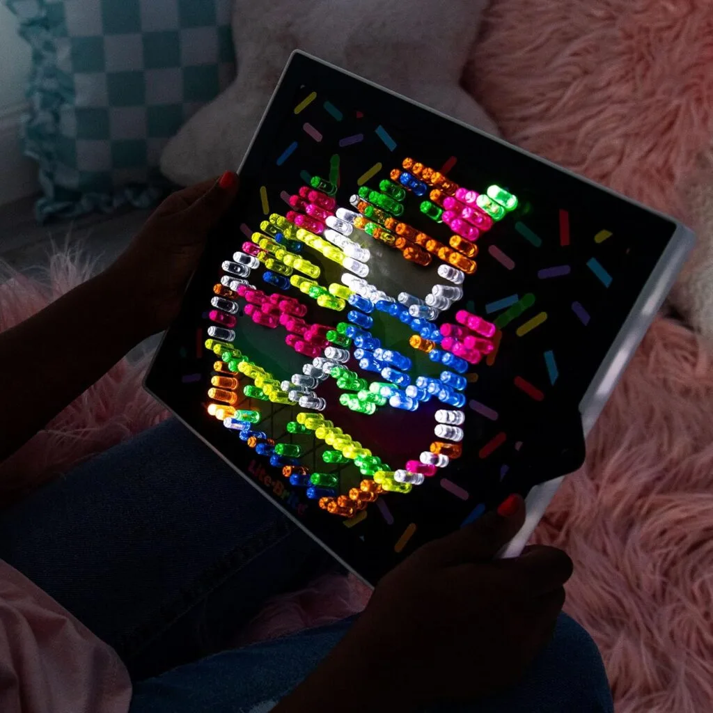 Classic Lite-Brite Retro Toy: Engaging light-up art activity that enhances educational learning through creativity and play. Perfect for kids.