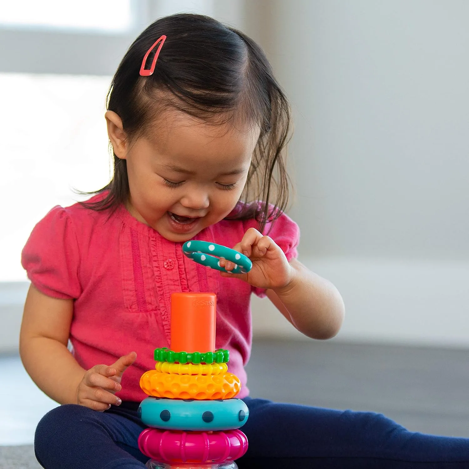 Colorful circle stack rings educational toy for ages 6+, promoting STEM learning and creative building skills with vibrant design and interactive play.